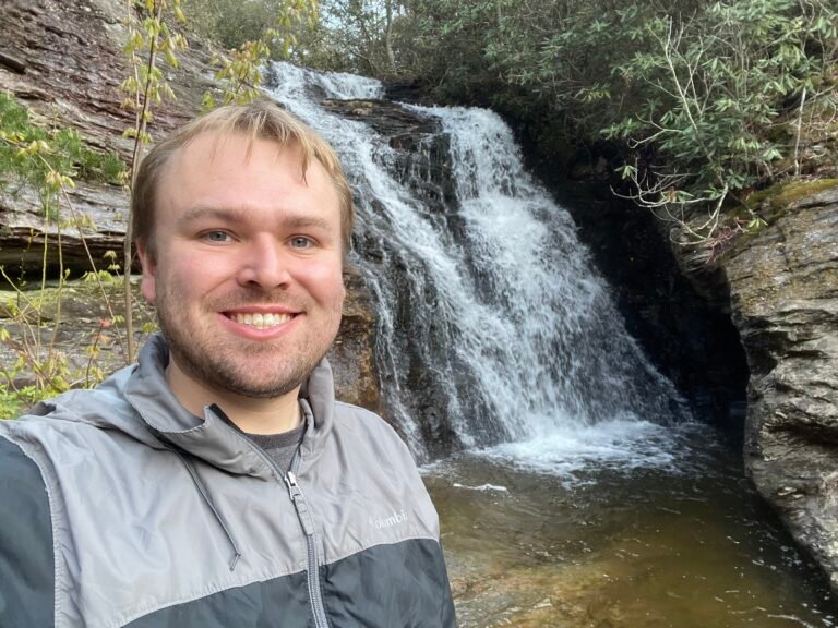 Kris Robinson, search marketing specialist, at a waterfall in western North Carolina